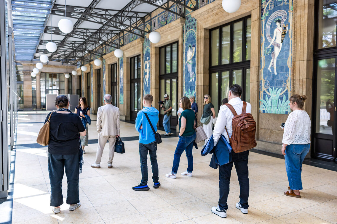 Group of people on a guided tour of the Wiesbaden Kurhaus
